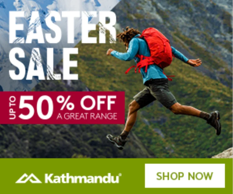 Kathmandu Easter Sale banner: up to 50% off a great range, a hiker leaping across a mountainside, and a Shop Now button
